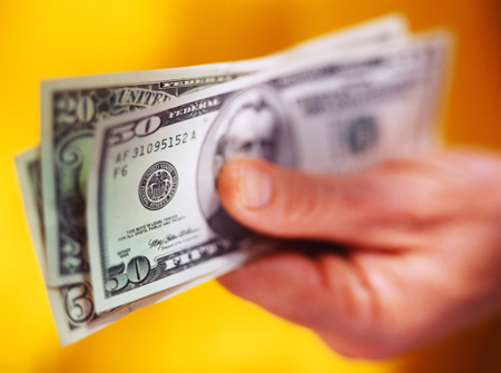 hand holding money